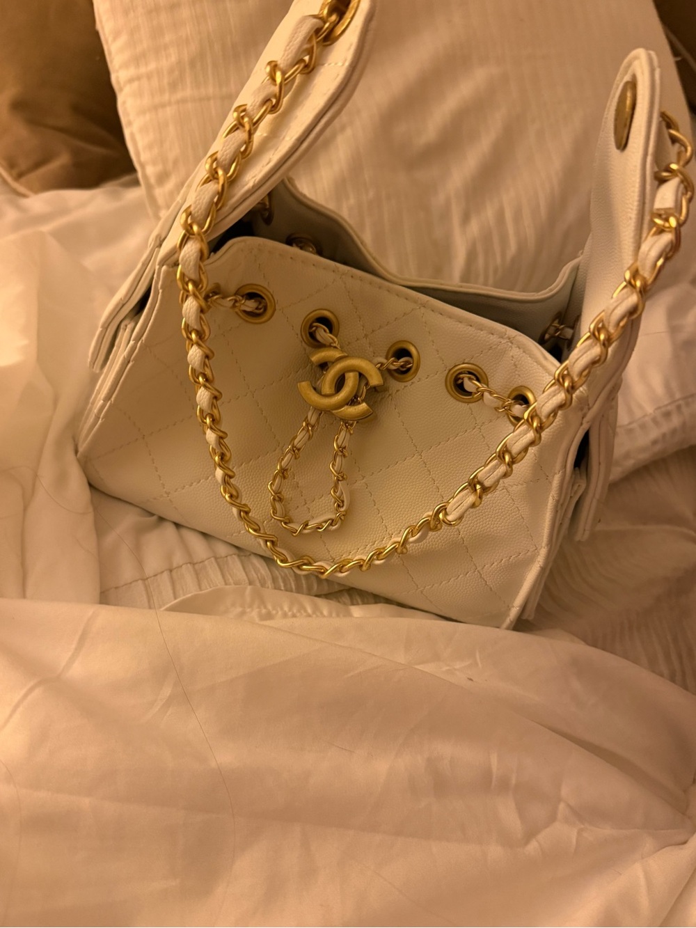 CHANEL Cream Quilted Drawstring Shoulder Bag with Gold Hardware